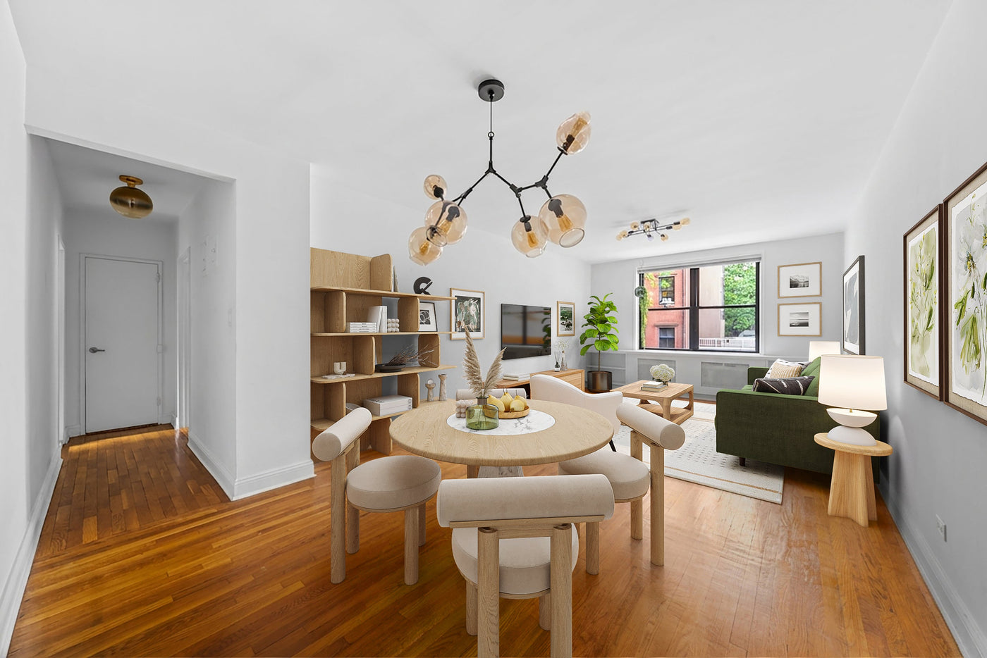 A dated living room digitally cleared and restaged by a Bella designer