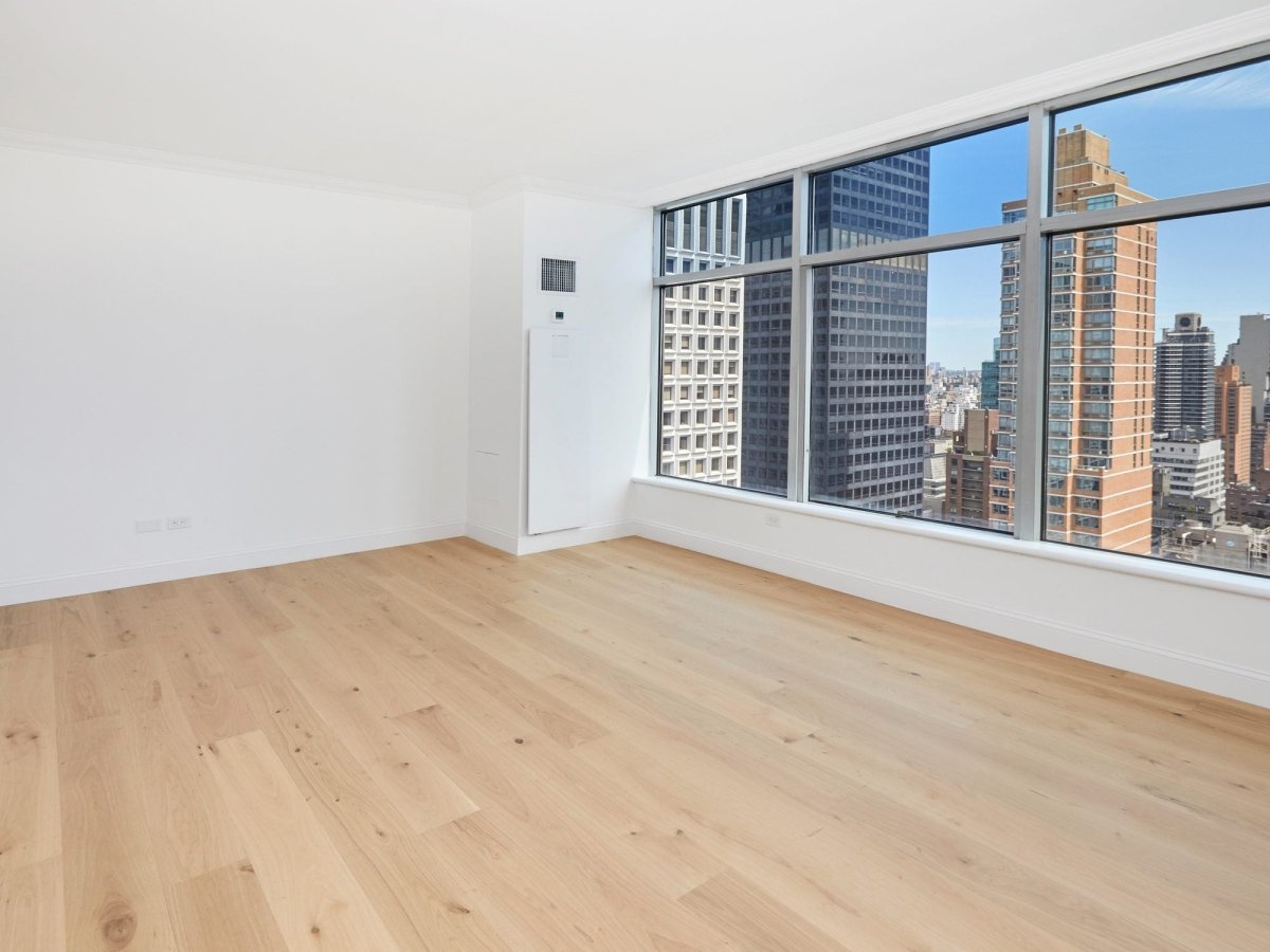 Midtown East primary bedroom, before