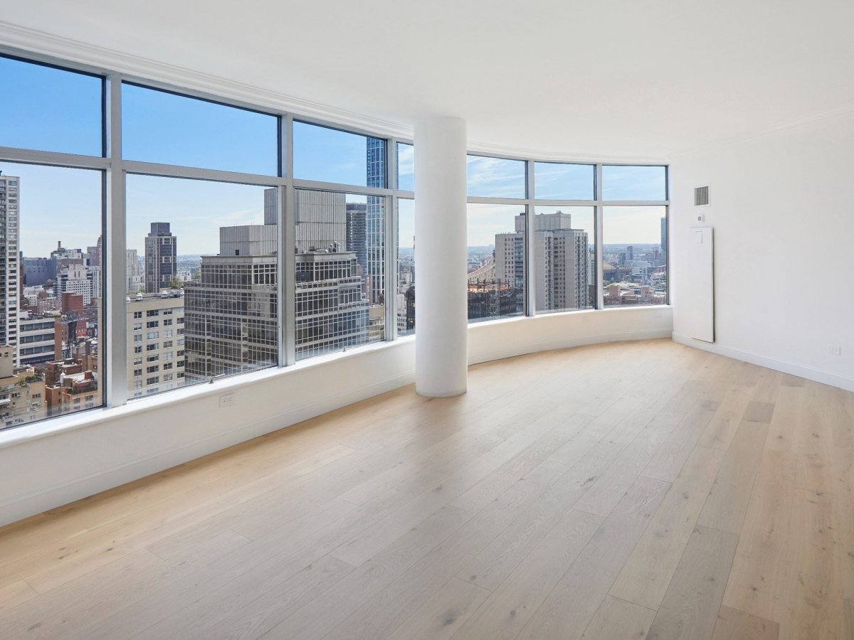 Midtown East skyline living and dining, before